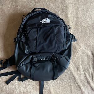 north face black backpack